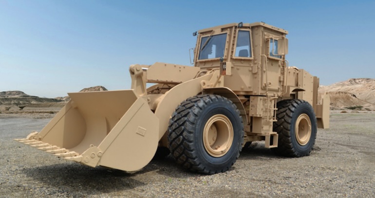 CAT 966H Military Wheel Loader fully armored with two-person cab